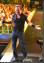 Bruce plays it up to us on the left side of the stage